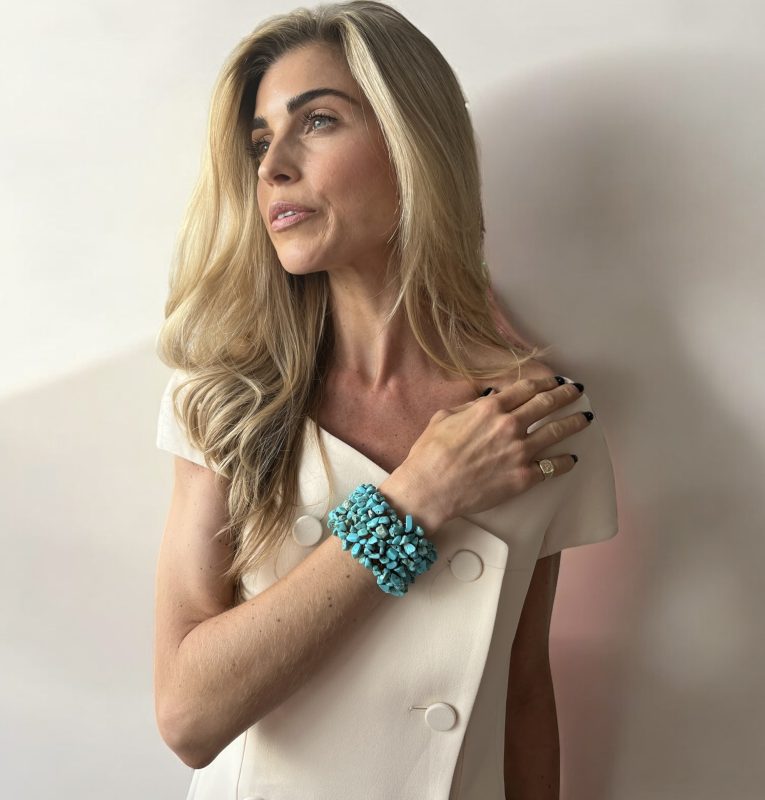 Front view of a Gemstone Cuff featuring multi-layered turquoise blue stones set in a handcrafted stainless steel wire mesh