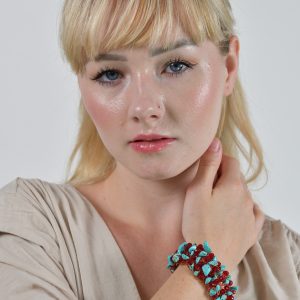 Make a dazzling statement with this Gemstone Crystal Bracelet, featuring Bohemian crystals and genuine gemstones in a bold 1-inch cuff. Hypoallergenic and customizable.