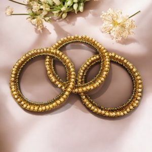 The Trio Bohemian Bangle Set features hand-crocheted Czech crystals on matte aluminum. Hypoallergenic, tarnish-proof stainless steel construction. Perfect for stacking or wearing solo. Artisan-crafted luxury for every occasion.