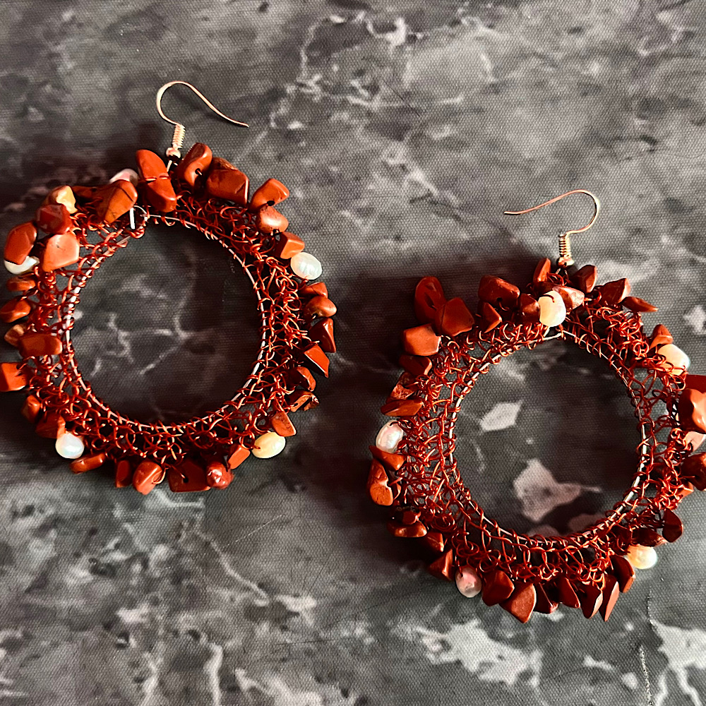 The Gemstone and Pearl Mandala Earrings combine unique gemstones with AA-grade pearls in a polished hoop design. Choose sterling silver or stainless steel hooks. Hypoallergenic & lightweight.